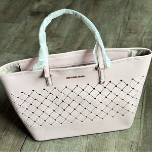 Michael Kors Pink Tote with Intricate Cutout Design